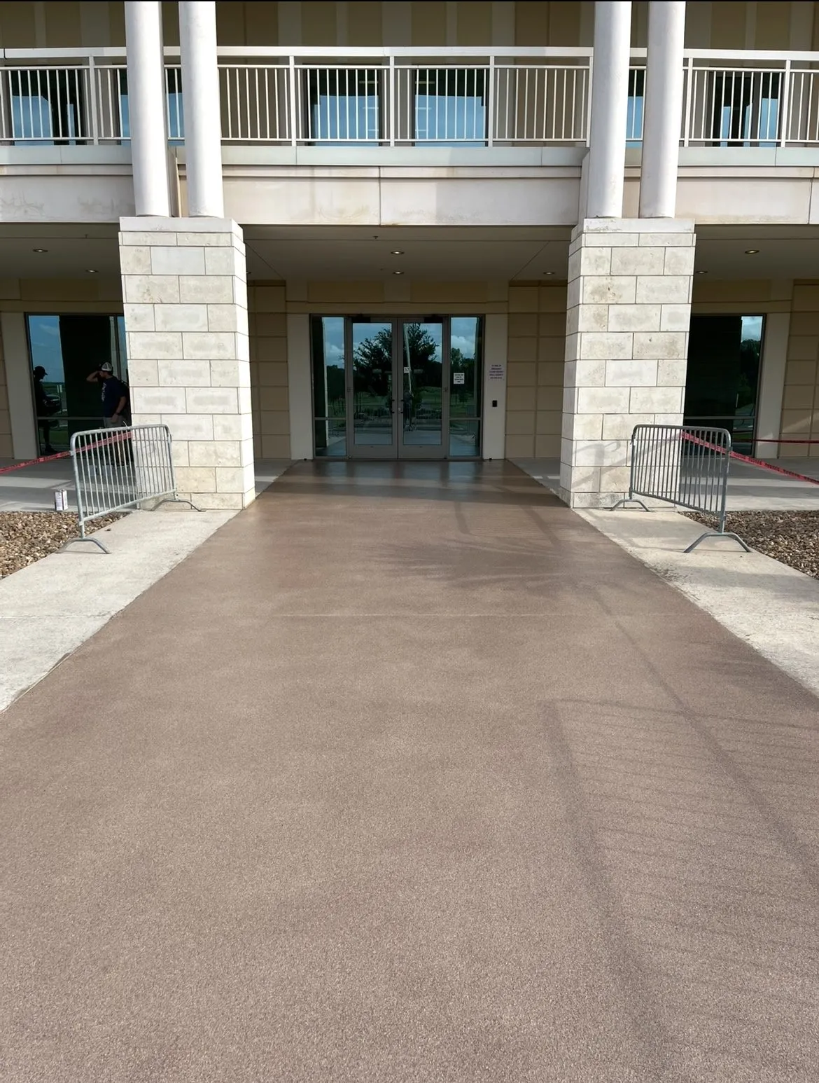 Exterior concrete entryway coating installed by Summit Surface Systems
